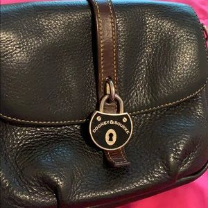 Black and brown crossbody Dooney and Bourke bag